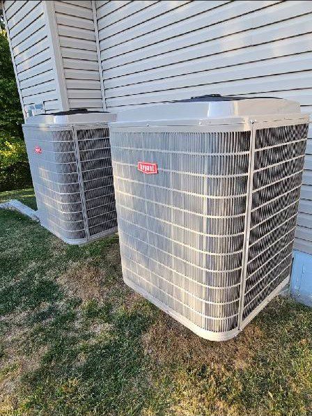 AC Unit2 (1) A residential AC installation on the Building back side